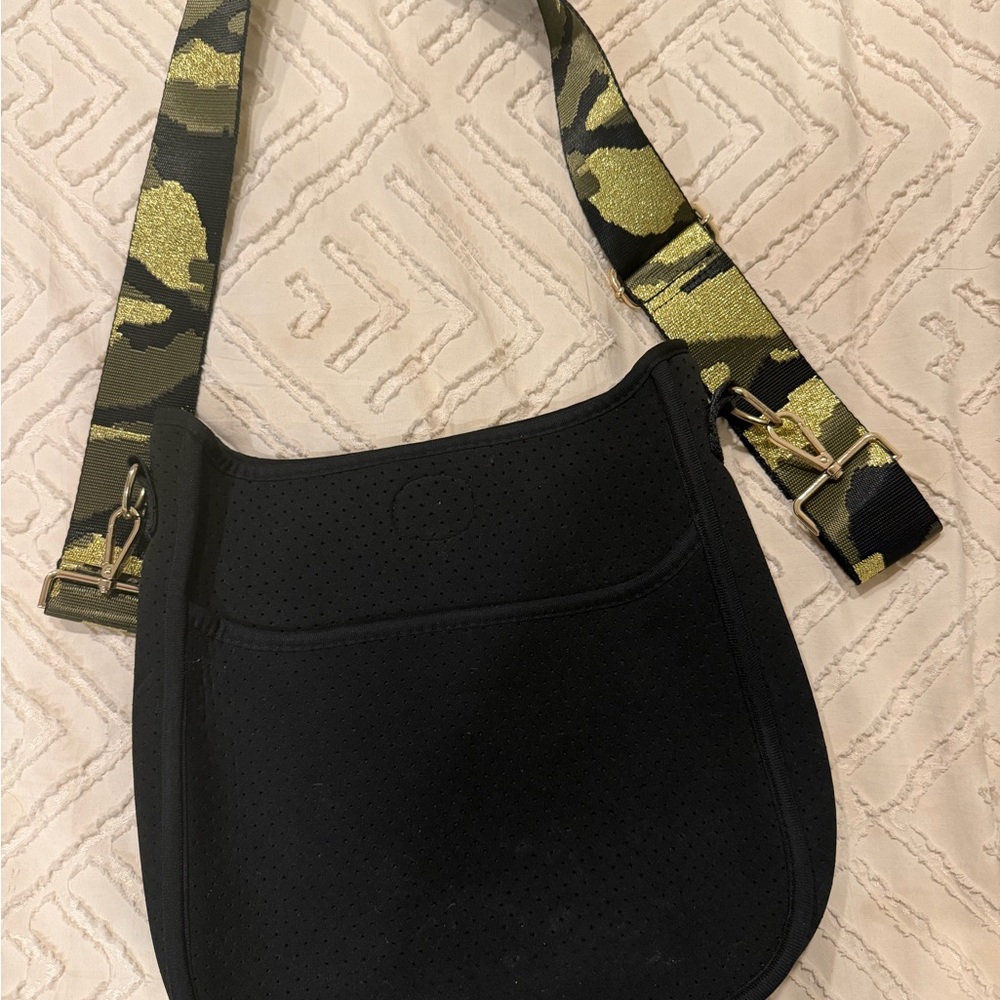 Stylish Black Crossbody Bag with Camouflage Strap